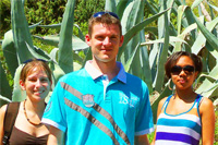 Ilirio's safari day trips - group of young people posing in a front of agava plant